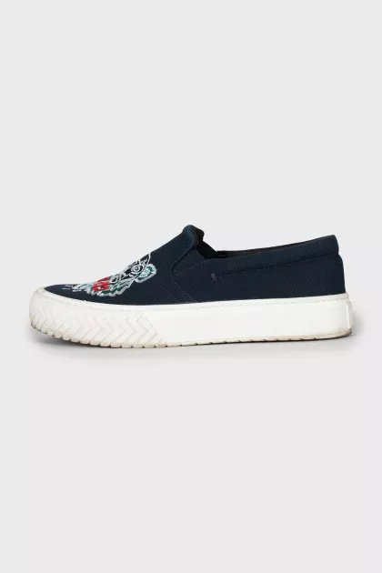 Textile slip-ons with embroidery