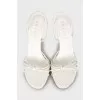 White sandals with golden heels