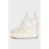 Textile wedge boots