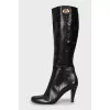 Black leather boots with heels