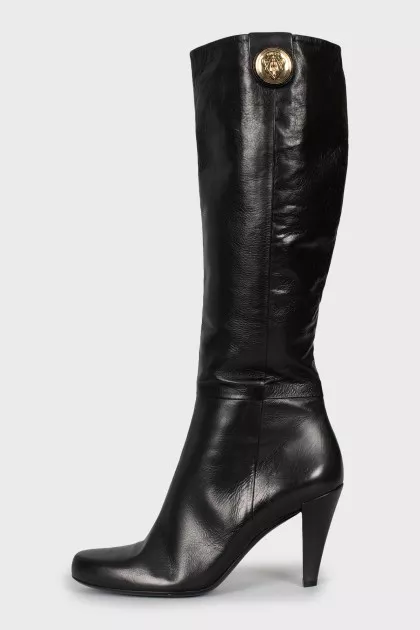 Black leather boots with heels