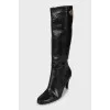 Black leather boots with heels