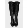 Black leather boots with heels