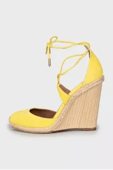 Yellow suede wedge shoes