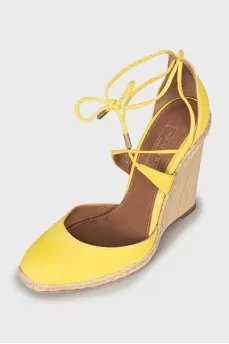 Yellow suede wedge shoes