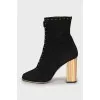 Suede ankle boots with gold heels