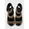 Sandals with golden spikes