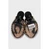 Sandals with golden spikes