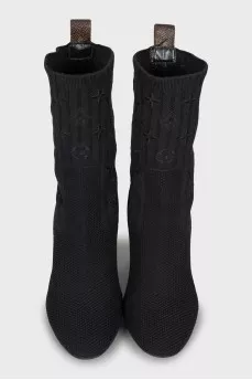 Silhouette ankle boots with signature embroidery