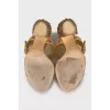 Gold leather sandals with crystals