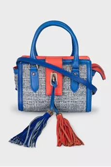 Textile bag with tassels