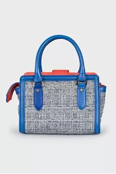 Textile bag with tassels