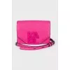Pink bag with metal logo