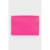 Pink bag with metal logo