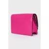 Pink bag with metal logo