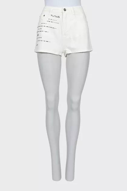 White denim shorts with rhinestones