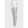 White denim shorts with rhinestones
