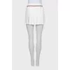 White pleated mini skirt