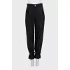 Trousers with ties at the bottom