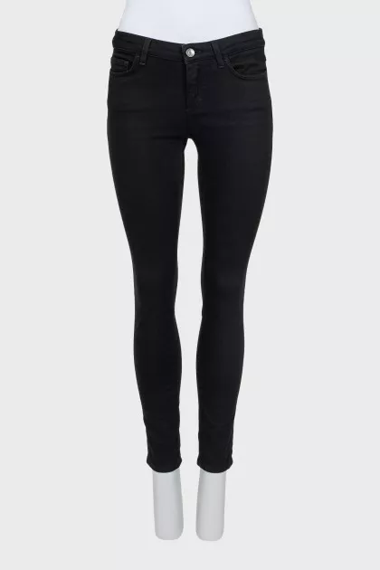 Skinny jeans with decorated pockets