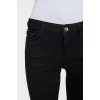Skinny jeans with decorated pockets