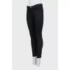 Skinny jeans with decorated pockets