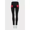 Skinny jeans with decorated pockets
