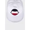 White cap decorated with a patch