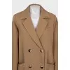 Brown trench coat with embroidery on the collar