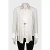 Silk blouse decorated with pleats
