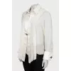 Silk blouse decorated with pleats