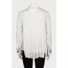 Silk blouse decorated with pleats