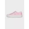 Pink sneakers with signature monogram