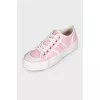 Pink sneakers with signature monogram