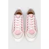Pink sneakers with signature monogram