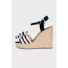 Black and white sandals with bows
