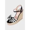 Black and white sandals with bows