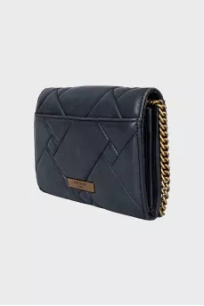 Black leather bag with gold chain