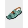 Green embroidered sandals