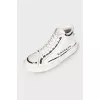 Men's leather sneakers with branded inscription
