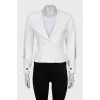 Fitted jacket with button and tag