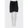 Shiny black skirt with tag