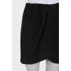 Shiny black skirt with tag