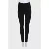 Skinny pants with zippers at the bottom
