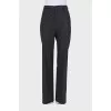 Straight trousers with decorative buttons