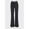 Flared trousers with cuffs
