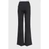 Flared trousers with cuffs