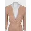 Fitted dress with shaped neckline