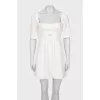 White dress with square neckline