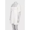White dress with square neckline